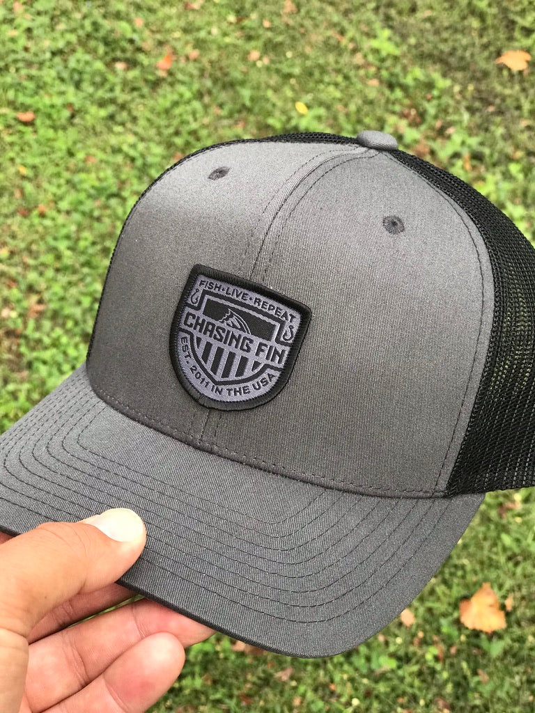 Blackout Flag Shield Trucker Cap